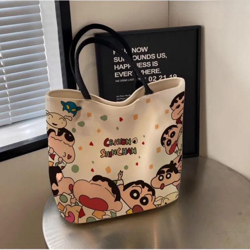 

Crayon Shin-chan Canvas Bag Women's Shoulder Bag Large capacity Student Commuter Handbag Cute Cartoon Portable Storage Bag Gift