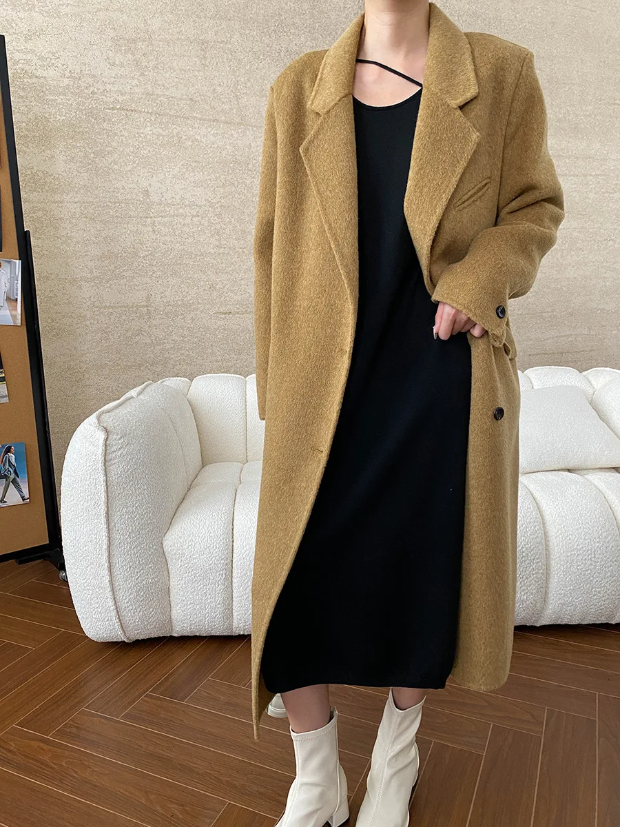 Winter women\'s casual solid color lapel long sleeved pocket decoration loose long coat