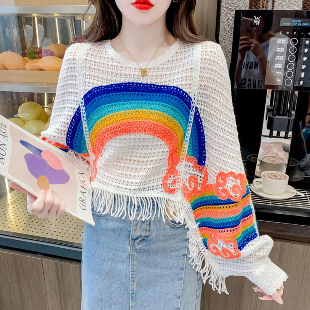 

Spring And Summer 2024 New Openwork Rainbow Striped Loose Sweater Female French Chic Tassel Design Elegant Leisure Sweater Tide.