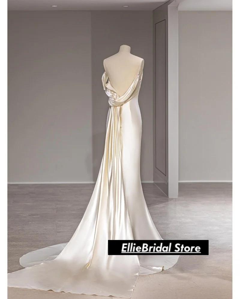 エレガントな白いサテンのストラップレスのイブニングドレス、アフリカの女の子のためのロングバックレスマーメイドプロムドレス、ベスティド・デ・ガラ2025、カスタマイズ可能