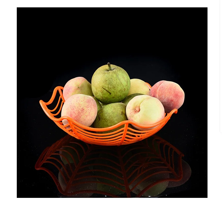 

Halloween decorations include spider fruit trays decorative items with design and creativity candies cookies and fruit baskets