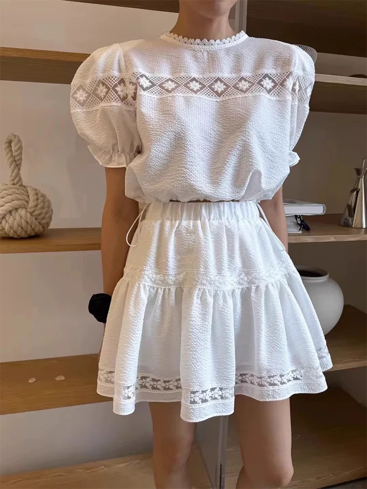 

Clothland Women Sweet Lace Patchwork Suit Hollow Out Short Sleeve Shirt Elastic Waist Mini Skirts Fashion Two Piece Set TA641