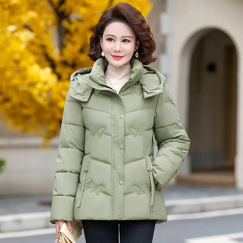 سترة شتوية جديدة 2025 ملابس خارجية على الطراز الكوري سترة فضفاضة متوسطة الطول مبطنة بالقطن مع جيوب ملابس خارجية عصرية TS461
