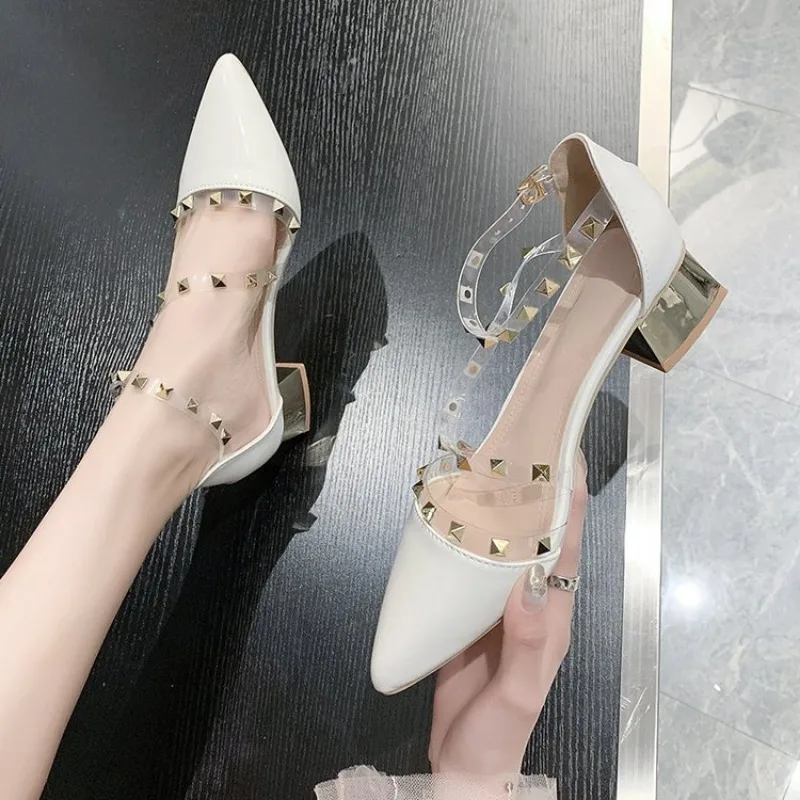 Pointed rivet sandals women\'s spring and summer 2024 new all-match thin transparent one-word buckle belt thick heel square root