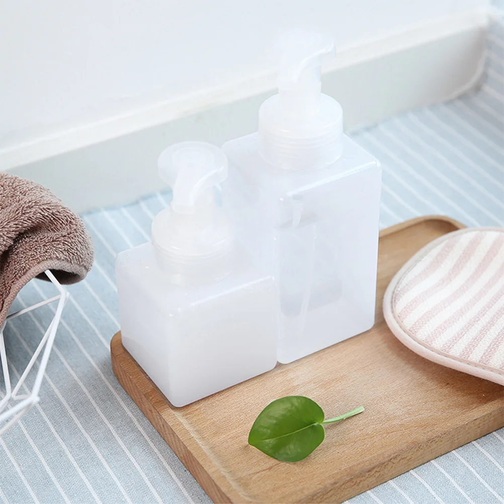 Bouteille de voyage Portable en plastique, distributeur à pompe rechargeable pour shampoing, Lotion, crème, lavage du corps, conteneur de produits de toilette, 2 pièces