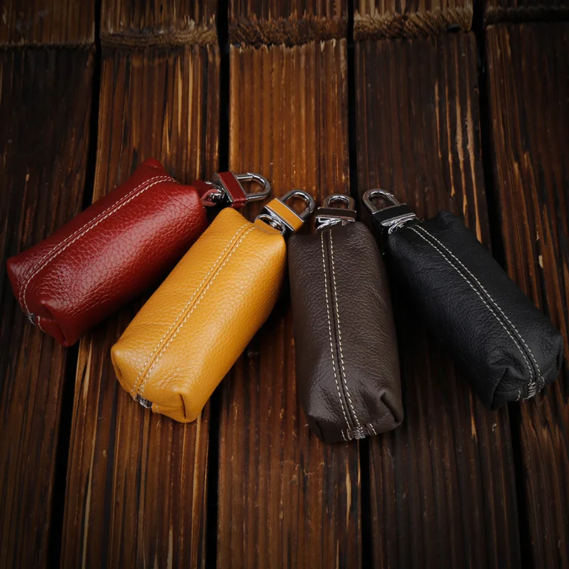 ISKYBOB-Bolso para llaves de cuero genuino para hombre y mujer, funda pequeña y delgada para llaves de coche, venta al por mayor, monedero, llavero, billetera, nuevo en