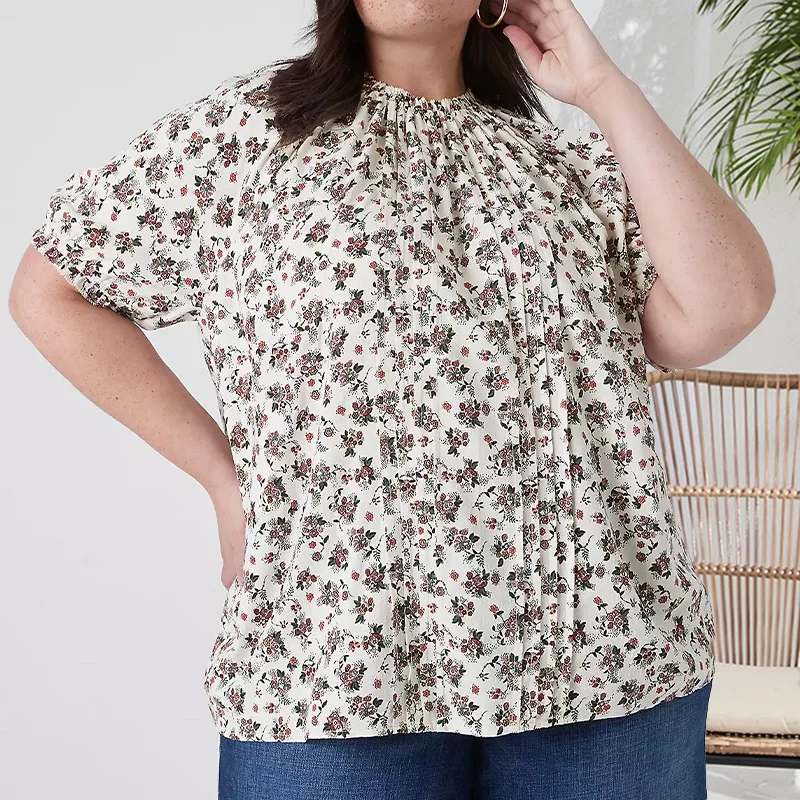 

Plus-Size Women's Shirt with Floral Print, Puff Sleeves, Round Neck, Elasticated Cuffs and Neckline, and Draped Decoration on th