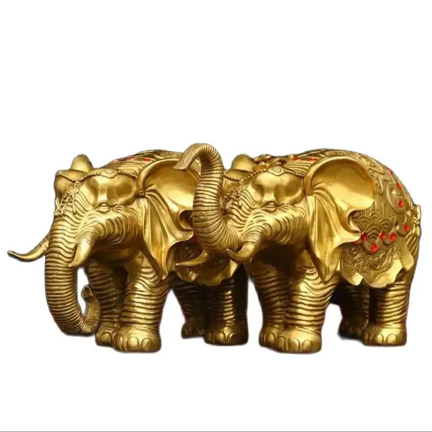 A pair of metal water absorbing patterns and copper elephant decorations for home, office, cultural and creative decoration