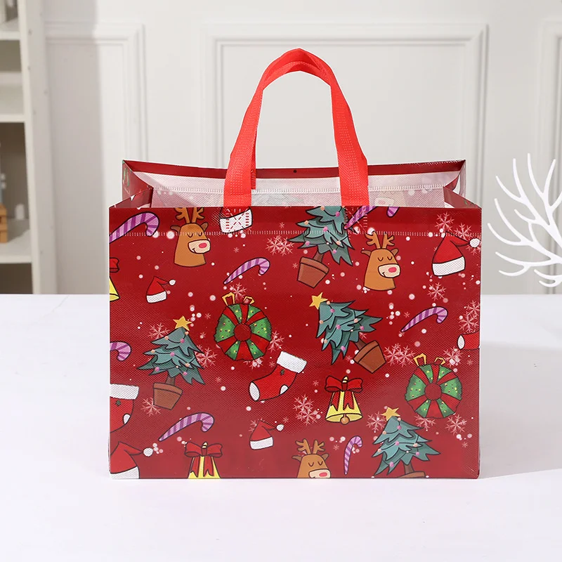 4 Uds. Bolsa de regalo de mano con estampado de muñeco de nieve de Papá Noel de Navidad de dibujos animados, exquisita serie navideña, bolsas de mano no tejidas