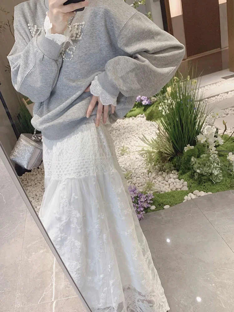 الكورية Sle الدانتيل المرقعة ألف خط تنورة مريحة بسيطة عارضة المرأة تنورة تخفيف تصميم الإحساس f طول تنورة #5