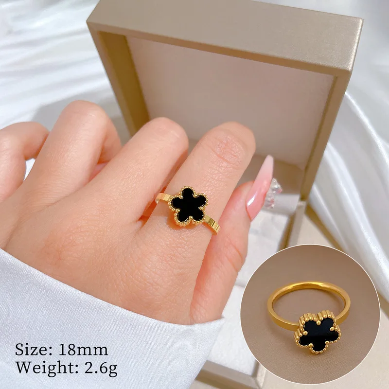 Edelstahl-Interlock-Ring mit zweifarbigen Zirkoneinlagen für Damen, trendiger stapelbarer Gold-Silber-Kontrast-Fingerschmuck als Geschenk – Detail 2