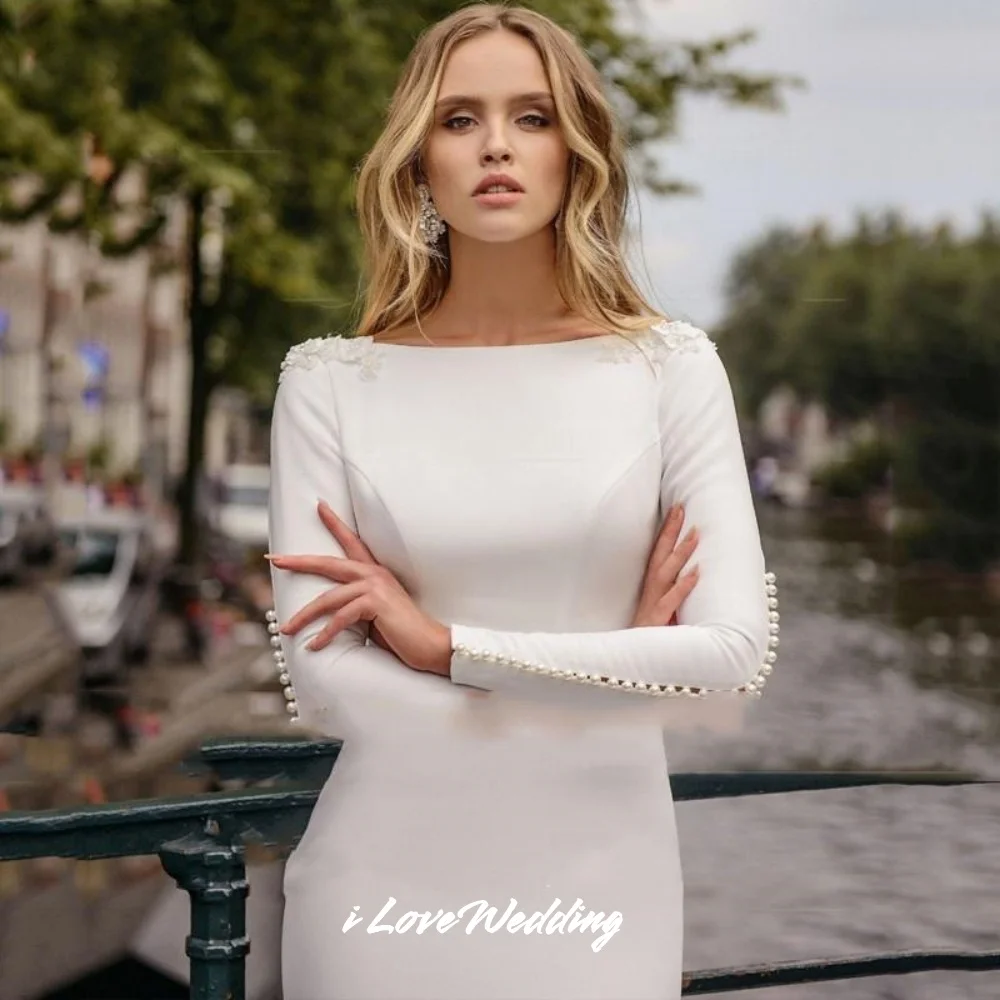 Abito da sposa bianco con o-collo 2025 Manica lunga senza schienale Perla Fiore Sirena Abiti da sposa arabi Trailing musulmano Pieghettato Personalizzato