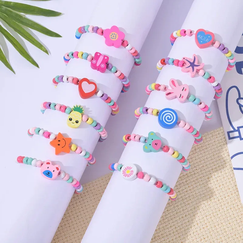12 sztuk/opakowanie Kolorowe bransoletki z drewnianymi koralikami z motywami z kreskówek dla dziewczynek, upominki na przyjęcie urodzinowe, prezenty dla gości na baby shower, wypełniacze do piñaty — zdjęcie 2