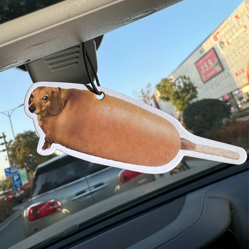 Hilton (Hotel Scent) Corn Dog Very Interesting and Fun Dog-Themed Car Air Freshener |   Rearview Mirror Hanger & Dual-Purpose Air Vent Clip |   Natural Material Aromatherapy Tablets |   Long-Lasting Fragrance for 90 Days |   Alcohol-Free |   Not Afraid of Direct Exposure to the Sun |   Designed Specifically for Odor Removal in Cars, Closets, and Bathrooms. |   Cartoon Animation Graphics |   Unisex |   Luxury-Grade Fragrance |