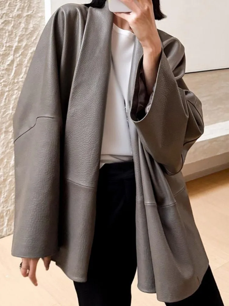 เสื้อแจ็คเก็ตหนังแท้สีพื้นสำหรับผู้หญิง ทรงหลวม คอวี แขนยาว ทำมือ ดีไซน์หรูหราทันสมัย ผลิตจากหนังแกะ