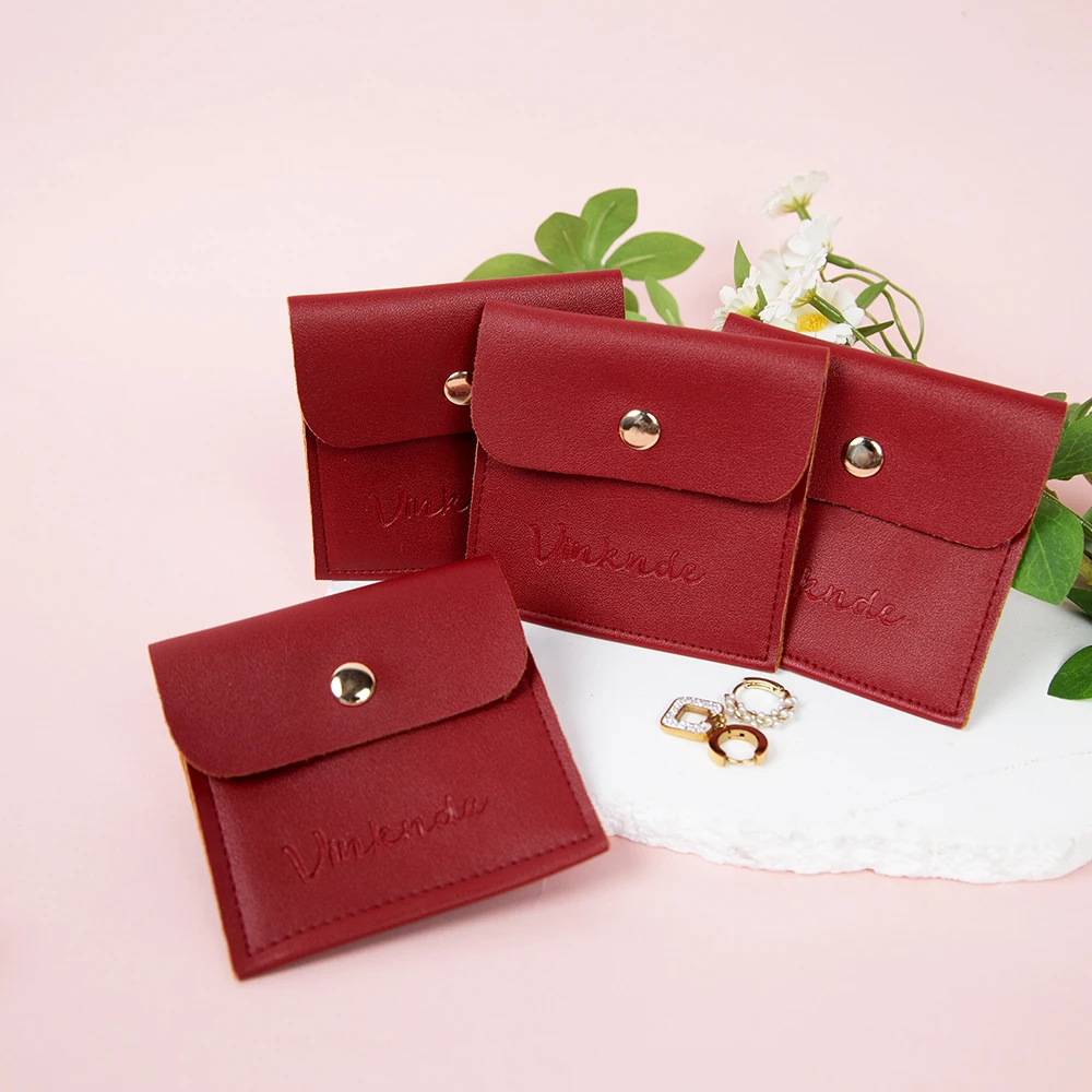 Bolsa de joyería con logotipo personalizado, bolsa de regalo con botones de cuero PU rojo, bolsas de joyería con cierre a presión, perfecta para anillos, collares y dijes