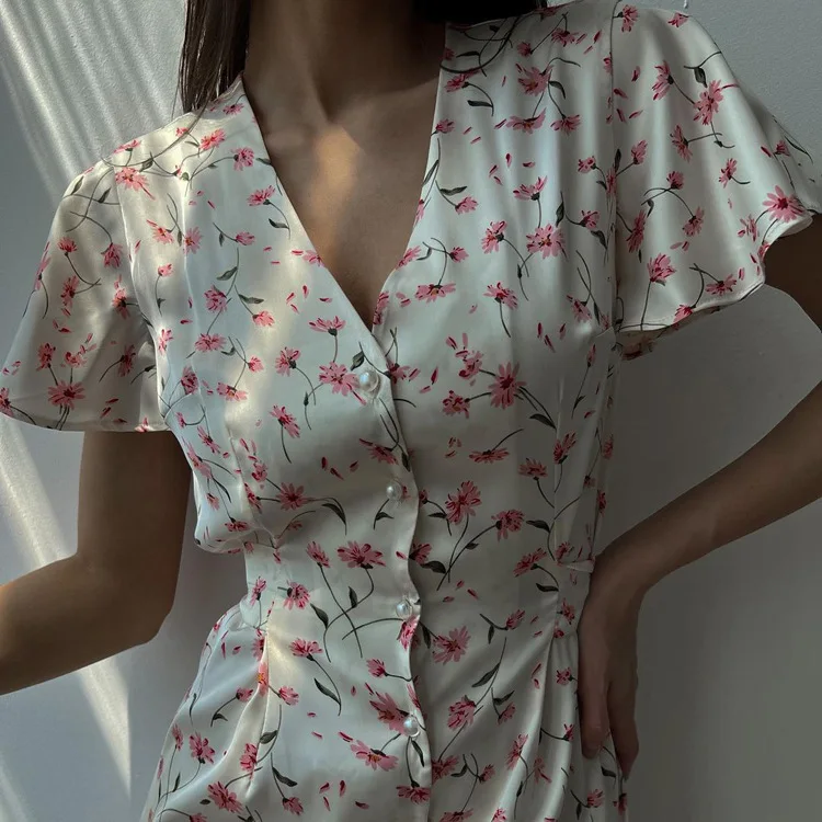 Nuovo abito camicia floreale annodato con scollo a V a maniche corte casual con vita snellente e un look snellente per l'abbigliamento da donna
