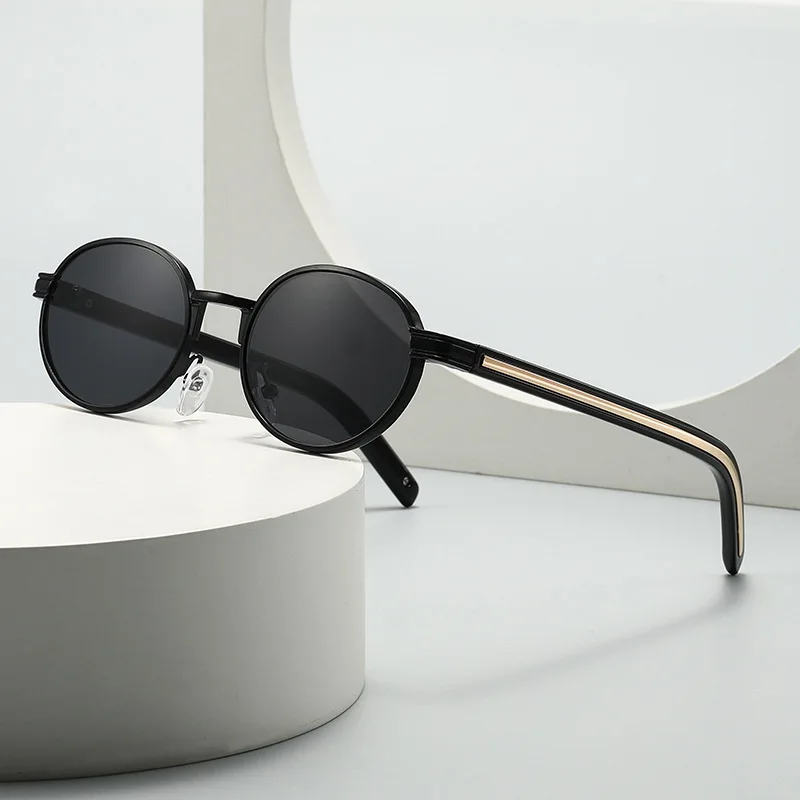 New retro oval frame sunglasses with gold colored temples suitable for men and women outdoor activities driving sun protection