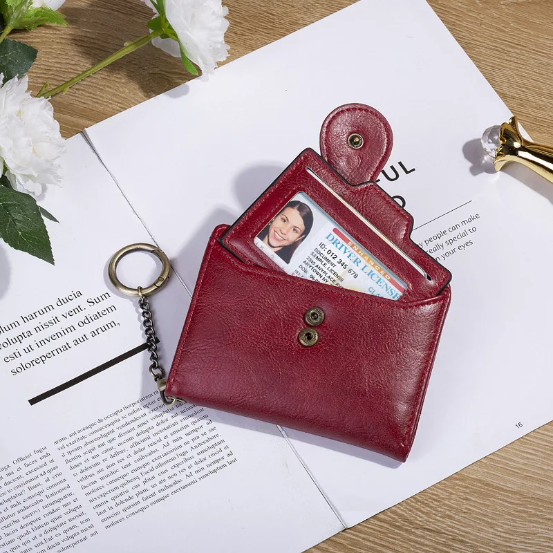 Damesportemonnees PU-leer Vrouwelijke portemonnee Hasp Korte tweevoudige portemonnee voor dames Mode Kaarthouder met ritssluiting Broekzak Sleutelhanger