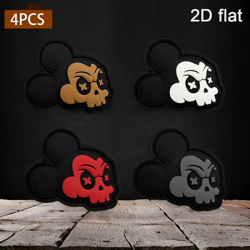 Available in various quantities: 1pc/2pcs/3pcs/4pcs. Dark Mickey Ear Skull PVC rubber patch comes with a matching hook-and-loop backing, features a glow-in-the-dark black base, and is available in four colors: brown, white, red, and gray. It has a full-seam design, a cool and unique style, suitable for decorating outdoor tactical backpacks, work vests, motorcycle helmets, and more