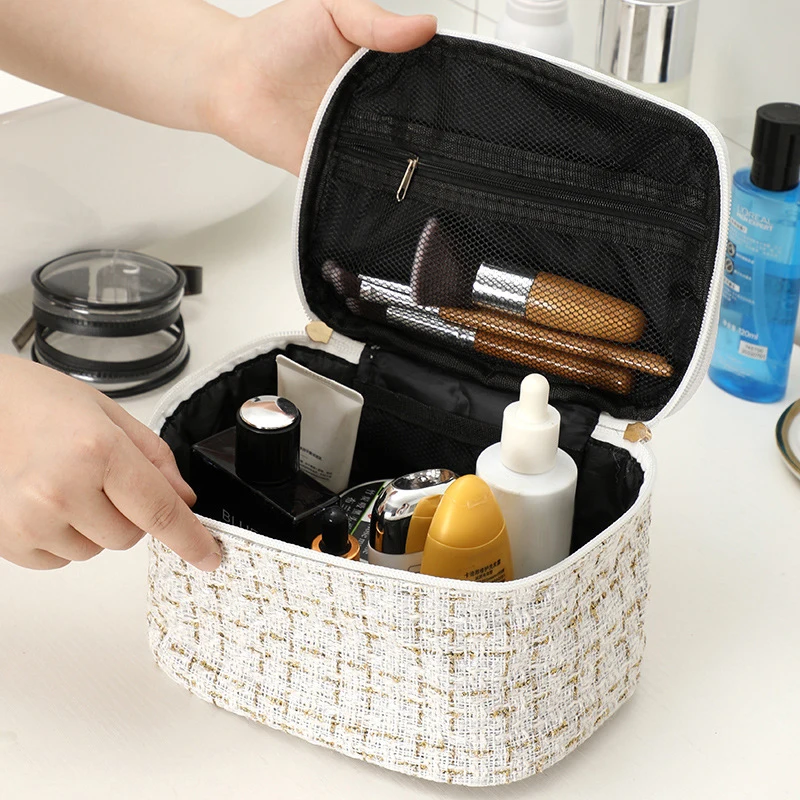 Borsa cosmetica di moda borsa portatile di grande capacità borsa per cosmetici intrecciati borsa per il trucco da viaggio per la casa