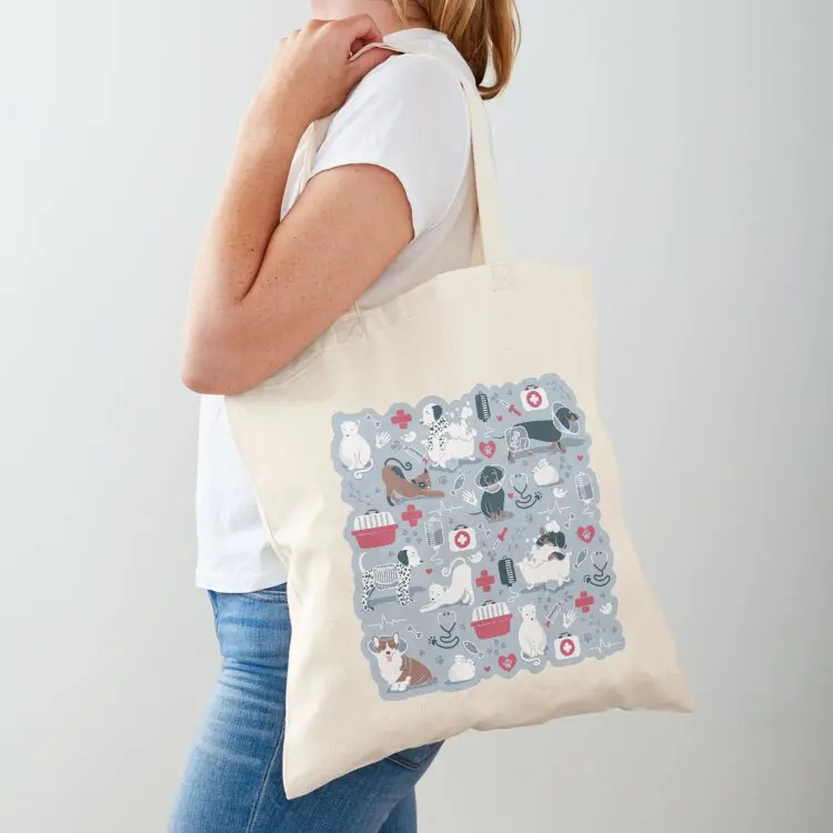 

Veterinary medicine, happy and healthy friends // pastel blue background red details navy blue white and brown cats Tote Bag