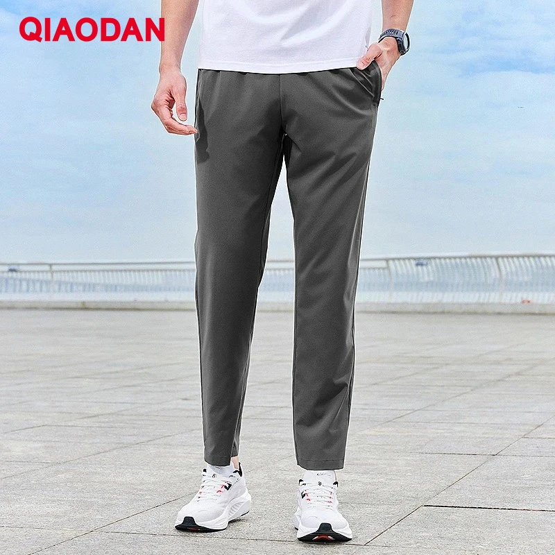 

QIAODAN повседневные тканые спортивные брюки мужские, новинка лета 2024, дышащие, быстросохнущие, удобные брюки из ледяного шелка XYK23241376