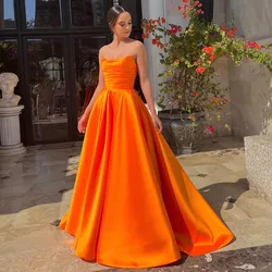 Orange Prom Dress Long 2023 Satin A Line Strapless Simple Gown for Women Sleeveless Backless Formal with Pockets