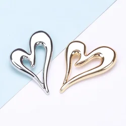 Dmari Women Brooches Trendy Metal Heart Shape Lapel Pin Gothic Design Accessories For Unisex Clothing Luxury Jewelry