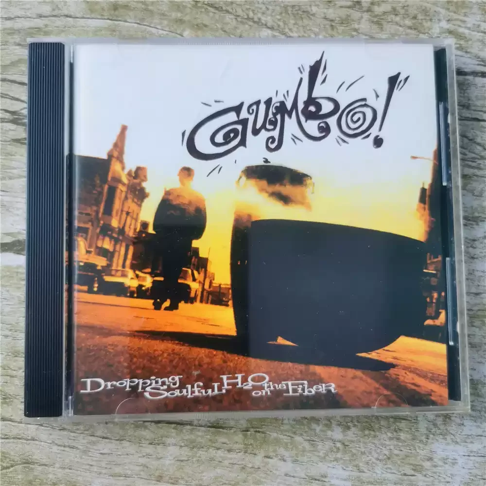 

CD Gumbo Dropping Soulful H2O из волокна. Этот трек подходит для проекта. Осозная рамка в стиле хип-хоп/soul 1990-х годов.
