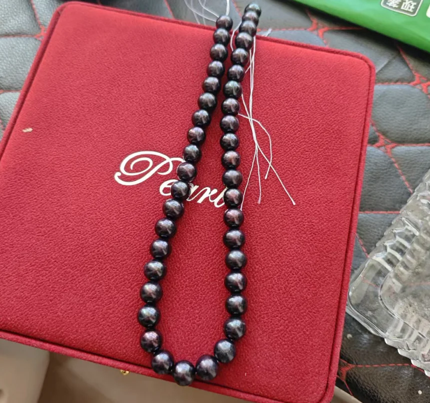 

Huge and rare new AAAAA+10-11mm black Tahiti pearl necklace 18/ inch 14k.