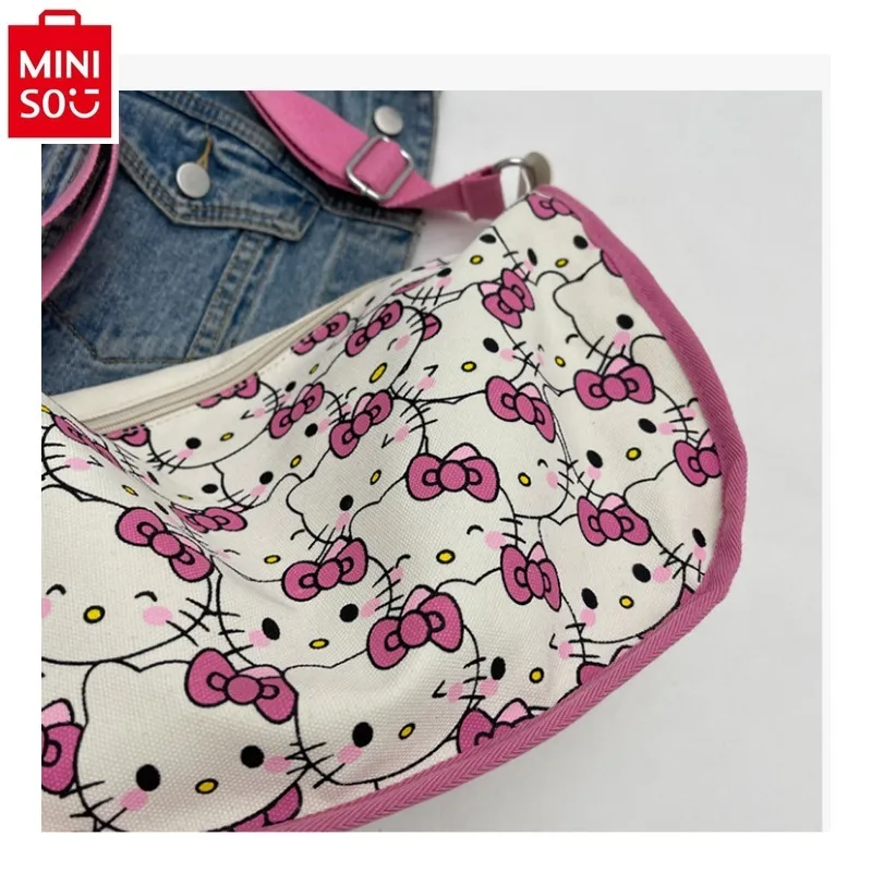 MINISO Hello Kitty-Bolso de mano portátil informal para mujer, bandolera de lona de gran capacidad, almacenamiento