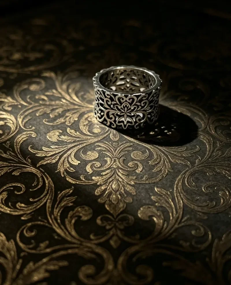 Retro embossed floral design, trendy women’s piece with irregular patterns, finger ring accessory.