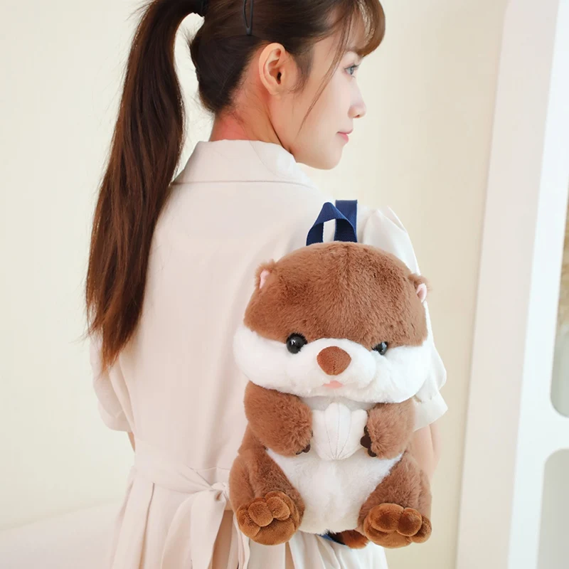 1Pc 28x18x18CM Lovely Otter Plush Backpack Dolls Cute Animal Otter Holding Shell Cartoon Backpack for Birthday Gifts