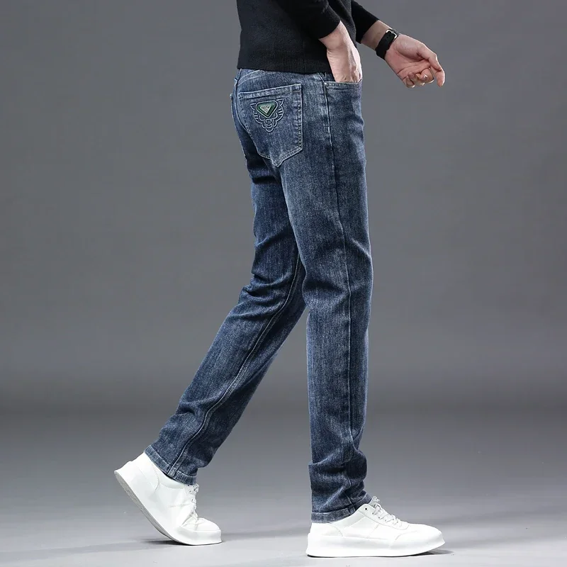 2024 Pantaloni lunghi elasticizzati larghi casual da uomo d'affari di marca di moda Four Seasons