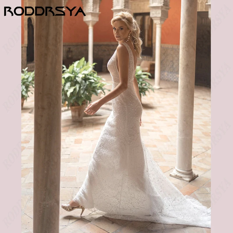 فستان زفاف بحورية البحر من RODDRSYA برباط على شكل حرف v عميقة بدون ظهر Vestido De Novia طول الأرض فستان زفاف على الشاطئ بدون أكمام لحفلات العروسبرباط على شكل حرف v عميقة بدون ظهر Vestido De Novia طول الأرض فستان زفاف ع