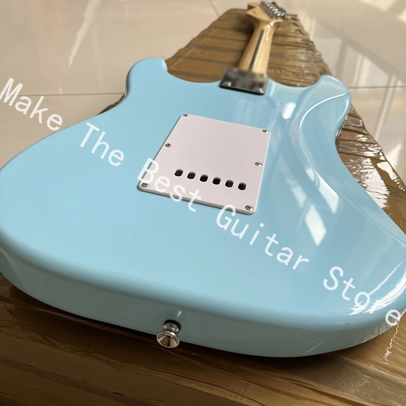 Exquisite bright blue electric guitar, tremolo bridge, professional level, fast delivery.