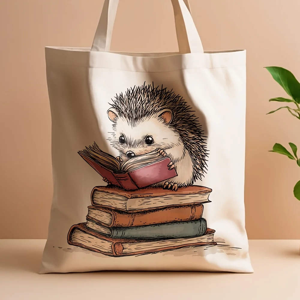 Bolsa de compras de lona reutilizable con diseño de erizo lector apilando libros, adecuada para uso diario, compras, escuela y viajes, 1 unidad