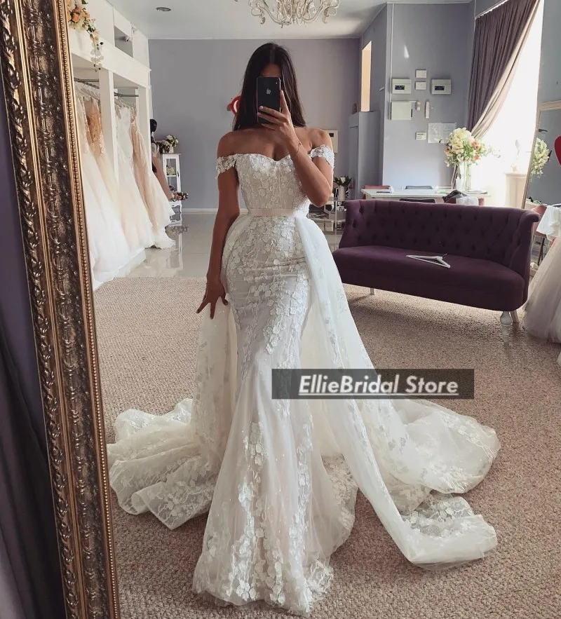 فساتين زفاف دانتيل رائعة فاخرة 2025 بدون أكتاف مزينة بحورية البحر فساتين زفاف مع ذيل قابل للانفصال حسب الطلب