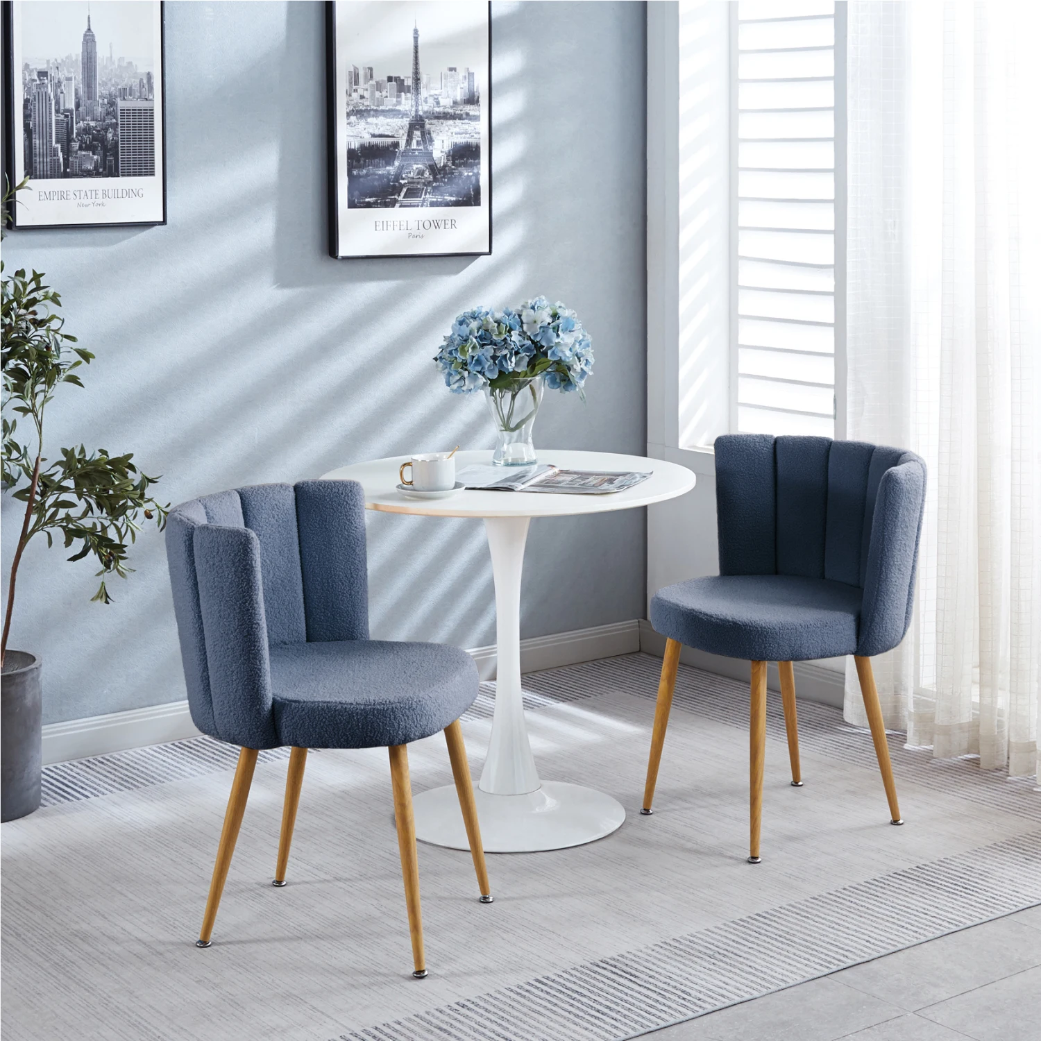 

Modern haze blue dining chair(set of 2 ) with iron tube wood color legs, shorthair cushions and comfortable backrest, suitable f