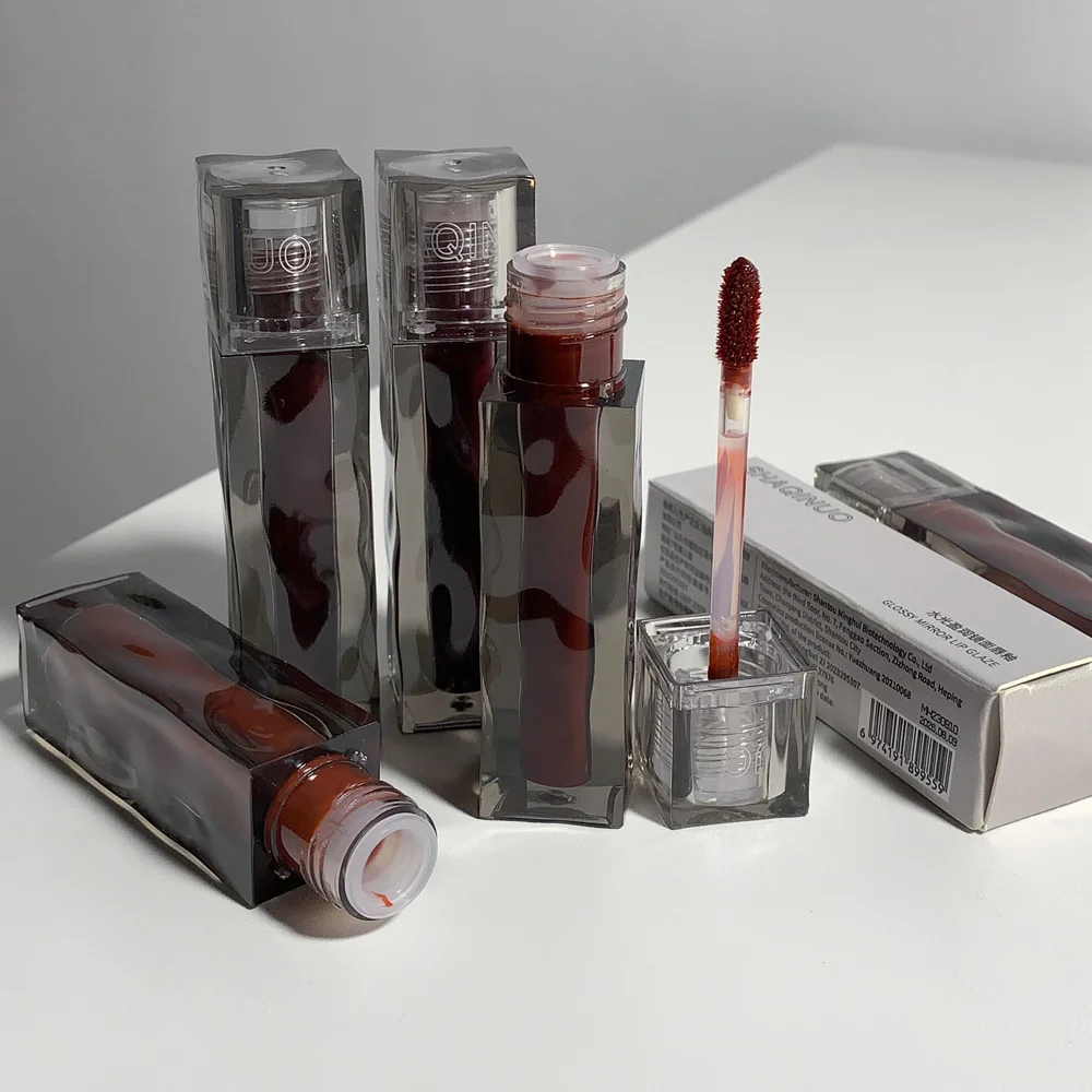 Brillo de labios marrón té negro, espejo de cristal transparente, esmalte de labios, lápiz labial líquido de Chocolate de Lava, maquillaje antiadherente, tinte de labios cosmético