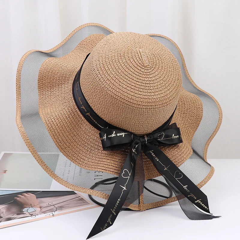 DONGYUN001 New summer floppy wide brim sun hat  Women Straw hat Cap Outdoor holiday Lady beach Casual floral Panama hat