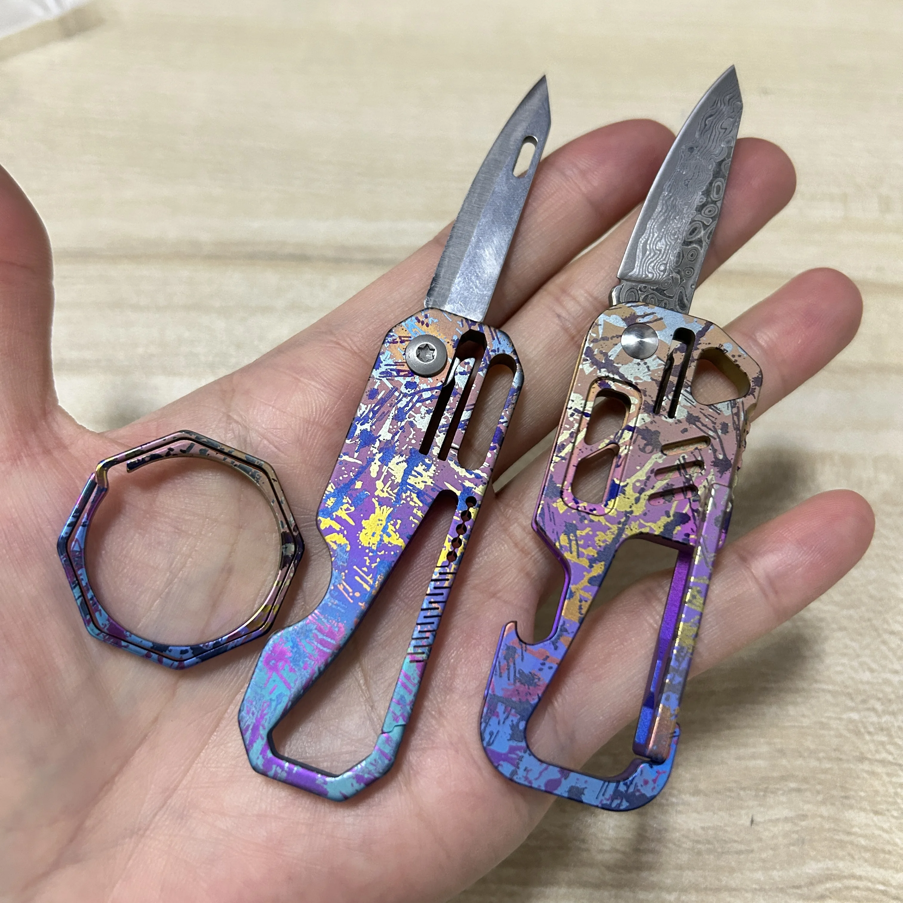 

Colored Titanium Alloy Folding Knife Damascus Blade Outdoor Climbing Multi-tool Buckle Security Self-defense Tool Bottle Opener