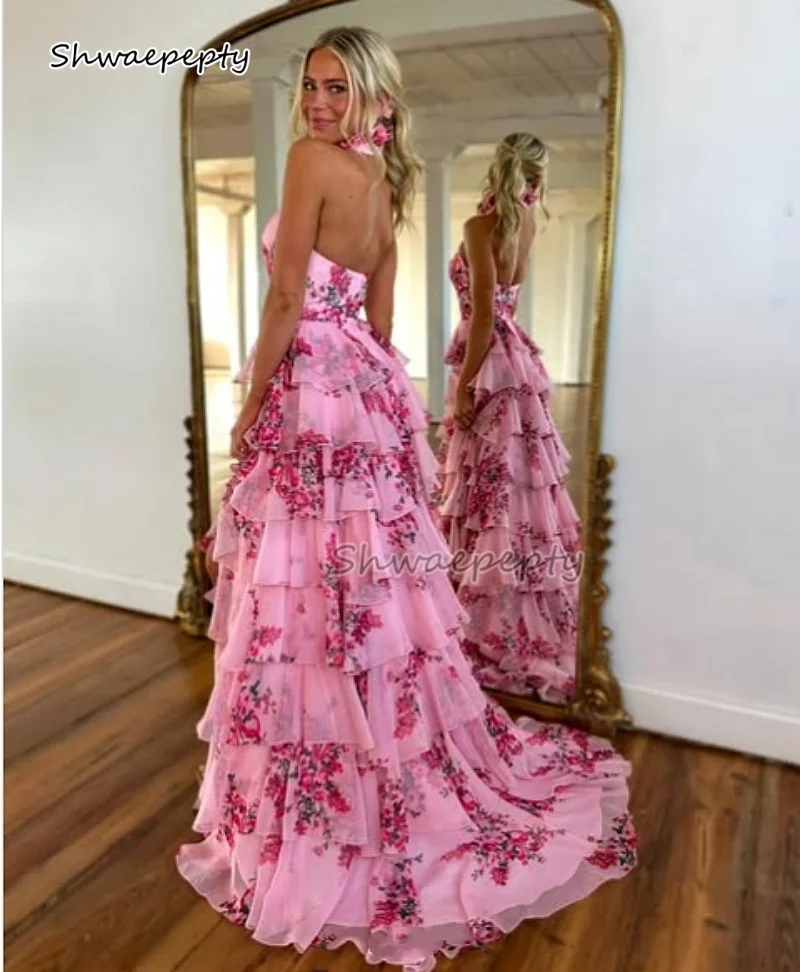 ที่กําหนดเองดอกไม้พิมพ์ยาว Ruffles พรหมชุด Halter คอ Backless ฉัตรเซ็กซี่ชุดราตรีด้านข้างที่กําหนดเองสวมใส่