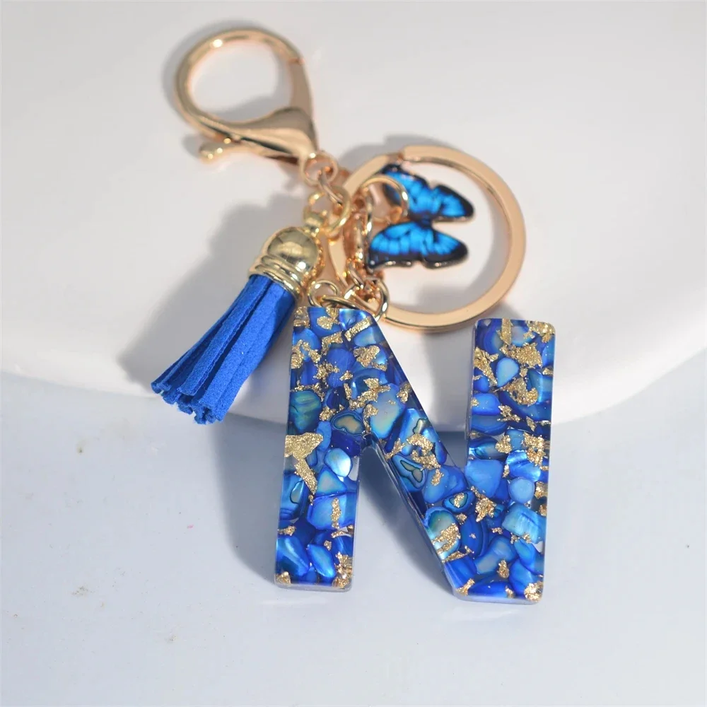 Modischer blauer glasierter Stein, A bis Z, Buchstaben-Schlüsselanhänger, 26 Initialen, Alphabet, Schmetterling, Quaste, Anhänger, Auto-Schlüsselanhänger, Damenschmuck, Geschenke