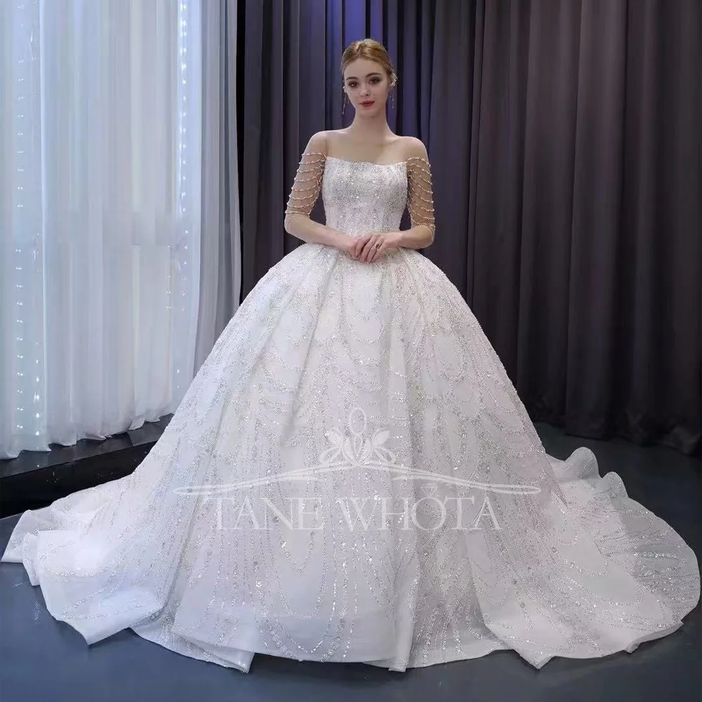 

Customizable O-Neck Long Sleeve Wedding Dress Lace-Up Back Sequined Beading