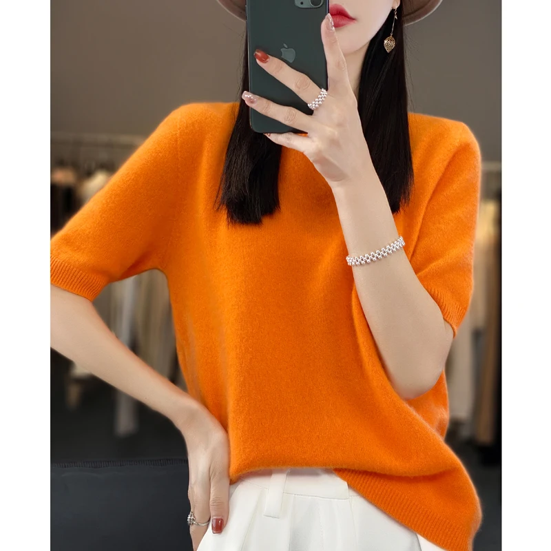 100% pure wool women\'s round neck sweater short sleeve seamless loose knit half sleeve bottoming sleeve.