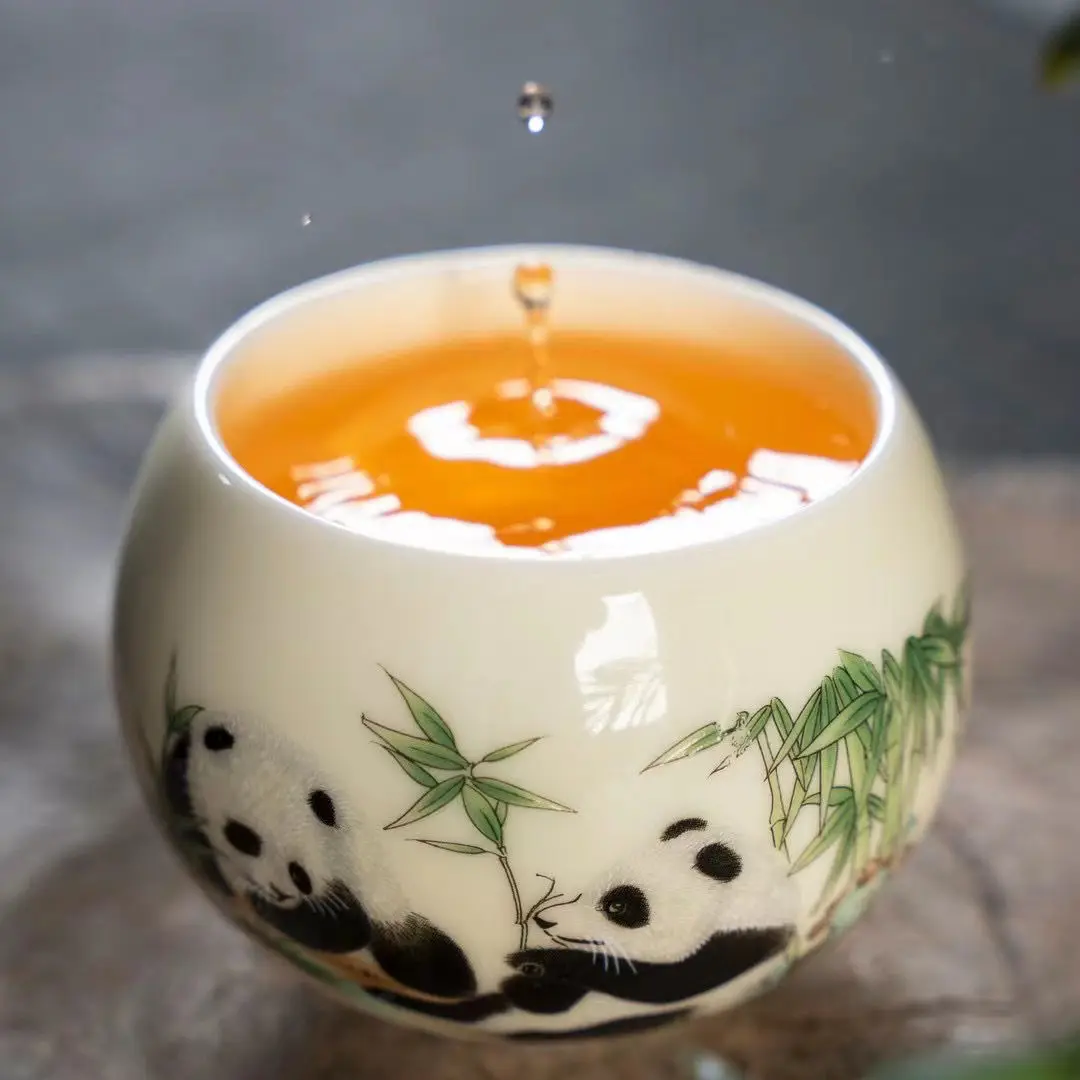 Master's cup, tea cup,  underglaze colored gemstone, yellow panda, sheep fat, jade, ceramic cup