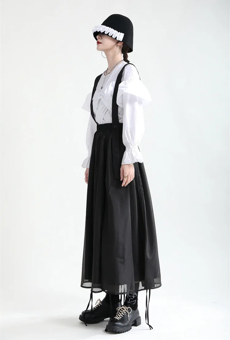 Design sense black suspender skirt 2024 spring clothes high waist slimming mid-length drawstring half skirt female