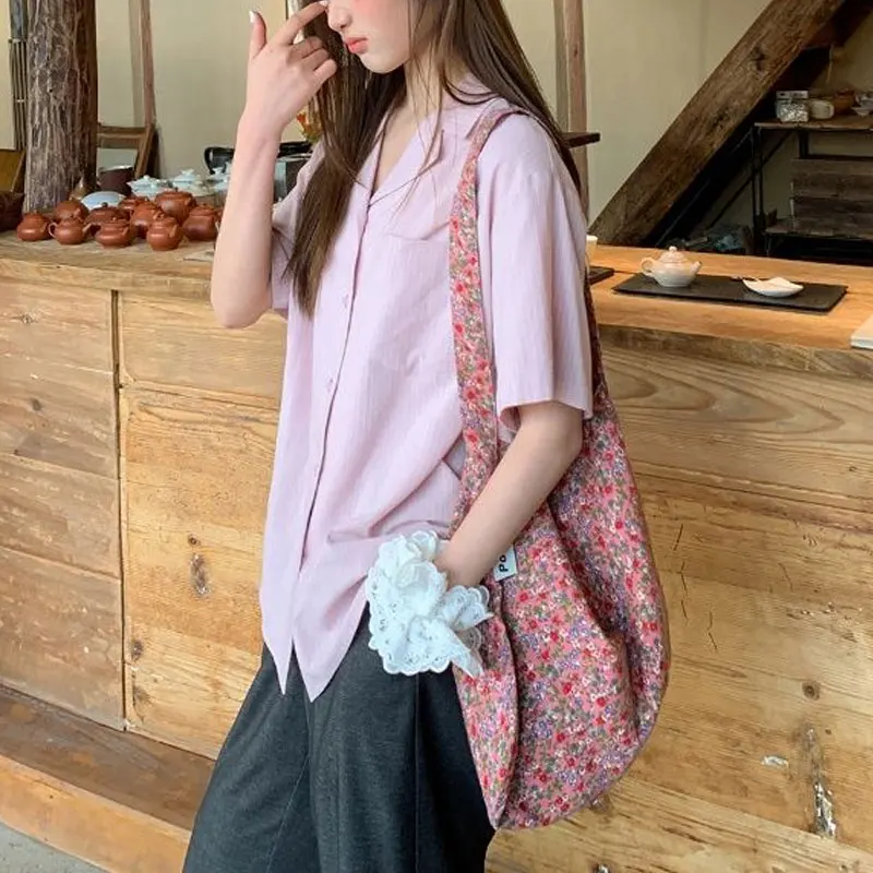 服韓国ストライプブラウスカジュアルターンダウン襟夏新ルーズベーシック半袖スタイリッシュなポケットスプライシングシャツ